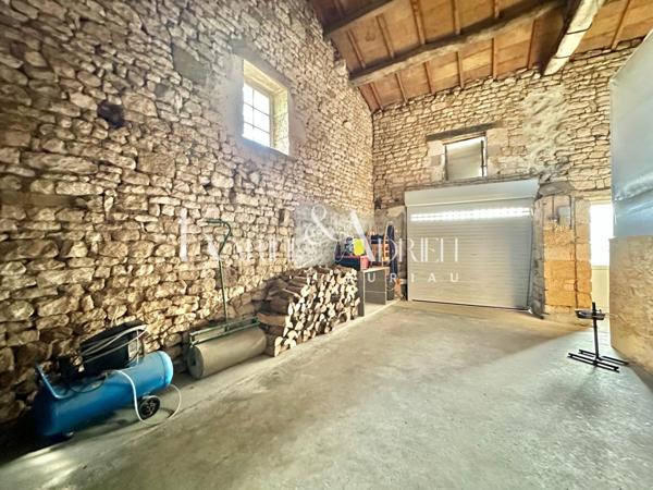 Charme et prestations confortables pour cette propriété en pierre