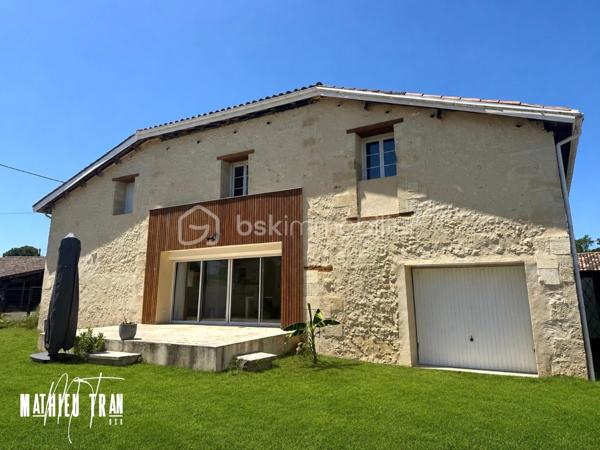 Découvrez cette maison de caractère, nichée dans un quartier paisible. 
Construite en 1945, elle offre un style de vie unique au cœur de la ville tout en garantissant un accès facile aux transports.

Cette spacieuse maison de 180 m² se déploie sur 4 pièces, en rez-de-chaussée vous y trouverez un salon séjour avec une cuisine ouverte, une suite parentale équipée de son dressing ainsi que sa propre salle d'eau. 

A l'étage, vous aurez de l'espace : 2 grandes chambres, une salle d'eau, un WC et la possibilité d'aménager une pièce d'environ 40m².

Elle est équipé d'une magnifique terrasse en travertin et d'un parking privé. 
Pour finir une grande dépendance d'environ 100m² faisant office de garage.

A 8 minutes de la ville de Coutras et de toutes les commodités indispensables, vous apprécierez tout le confort d’un mode de vie urbain sans compromis sur l’espace. 

Laissez-vous séduire par cette rare opportunité ! Contactez MATHIEU TRAN pour plus d'informations.