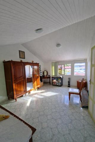 Cadre calme et volumes généreux pour cette maison familiale