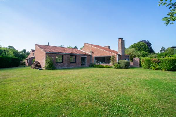 Maison de plain-pied en premier rang golf de Brigode