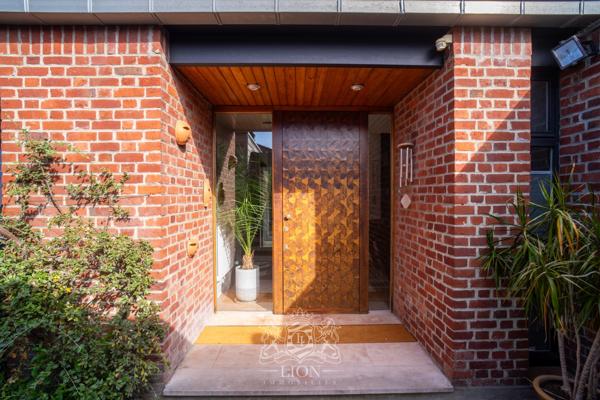 Maison de plain-pied en premier rang golf de Brigode