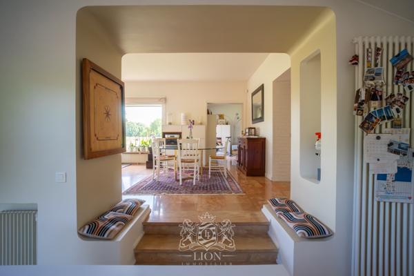 Maison de plain-pied en premier rang golf de Brigode
