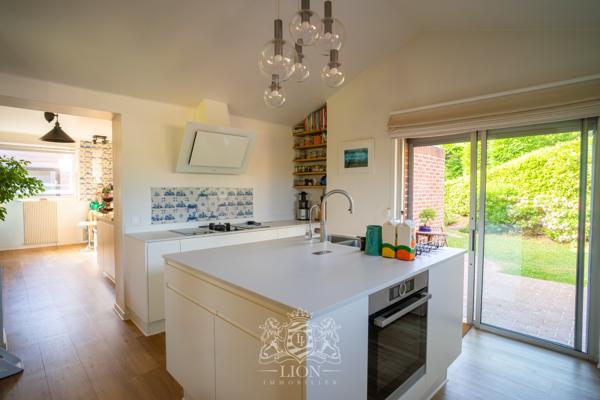 Maison de plain-pied en premier rang golf de Brigode