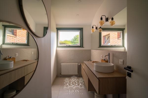 Maison de plain-pied en premier rang golf de Brigode