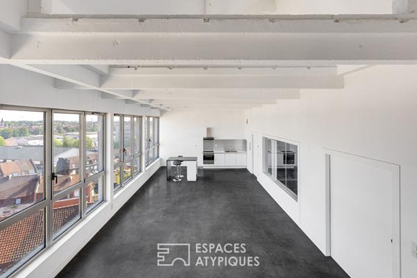 Loft brut à aménager avec rooftop à Roubaix