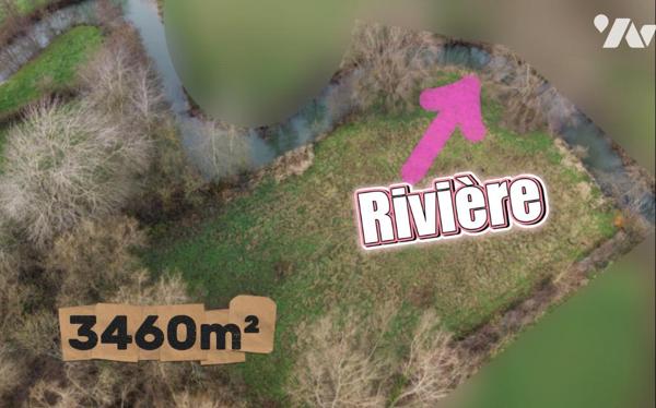 Parcelle en nature de pré d'une superficie de 3460m² non enclavée avec accès.