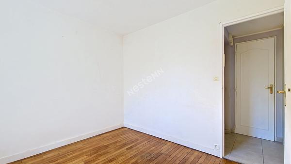 Bel appartement 3 pièces lumineux avec balcon, 2 chambres, garage, cave et parking privatif dans une résidence sécurisée