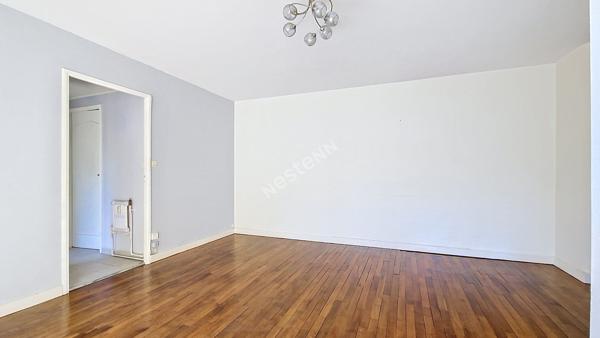 Bel appartement 3 pièces lumineux avec balcon, 2 chambres, garage, cave et parking privatif dans une résidence sécurisée