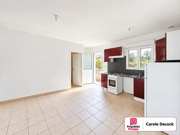 Appartement T2 une chambre box, parking, cave