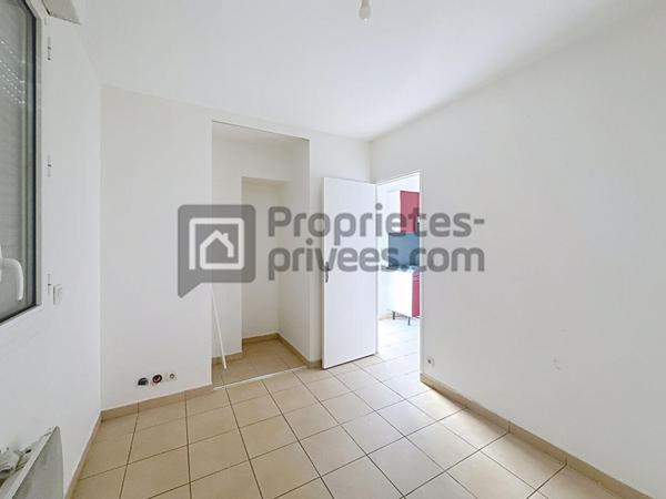 Appartement T2 une chambre box, parking, cave