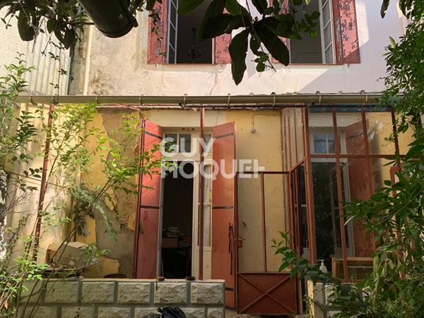 Maison de ville à faire revivre