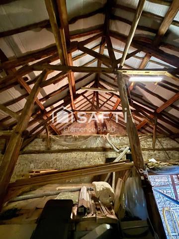 Maison 110m² avec terrain constructible, garage et atelier