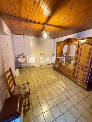 Maison 110m² avec terrain constructible, garage et atelier