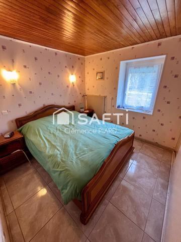 Maison 110m² avec terrain constructible, garage et atelier