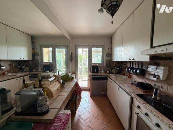 Appartement T4 de 82 m² avec jardin et garage