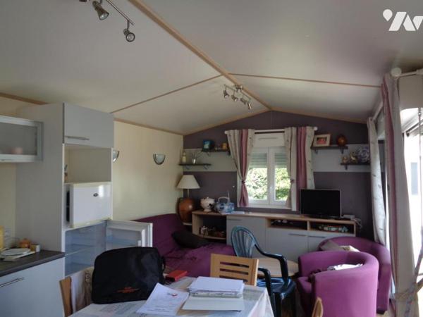 Chalet en ossature bois de 36,40 sur terrain 416 m² à 500 m de la plage. TRES RARE.