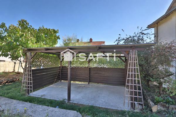 Maison avec jardin, garage et dépendances