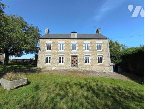 A 5 min de la ville de Condé sur Noireau , une maison ancienne au calme dans un endroit verdoya...