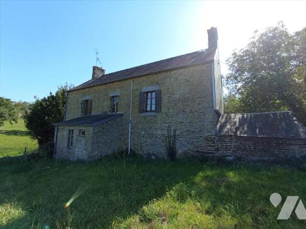 A 5 min de la ville de Condé sur Noireau , une maison ancienne au calme dans un endroit verdoya...