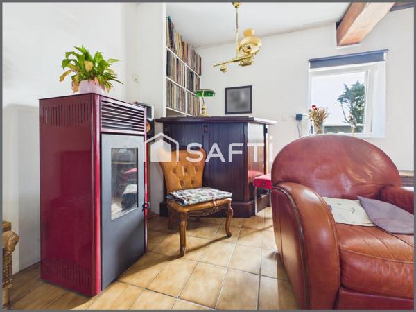 Maison au calme avec jardin, stationnement et potentiel d'extension