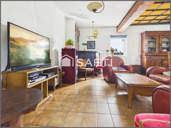 Maison au calme avec jardin, stationnement et potentiel d'extension