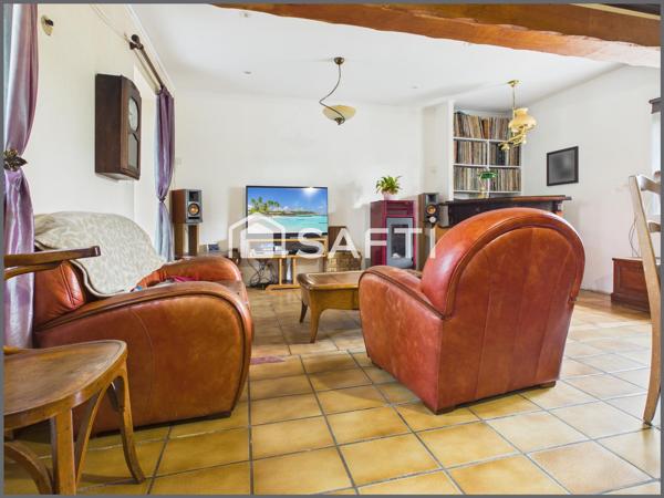 Maison au calme avec jardin, stationnement et potentiel d'extension
