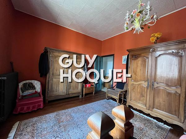 Grande bâtisse de caractère avec jardin, garages et fort potentiel à Toulon Sur Arroux