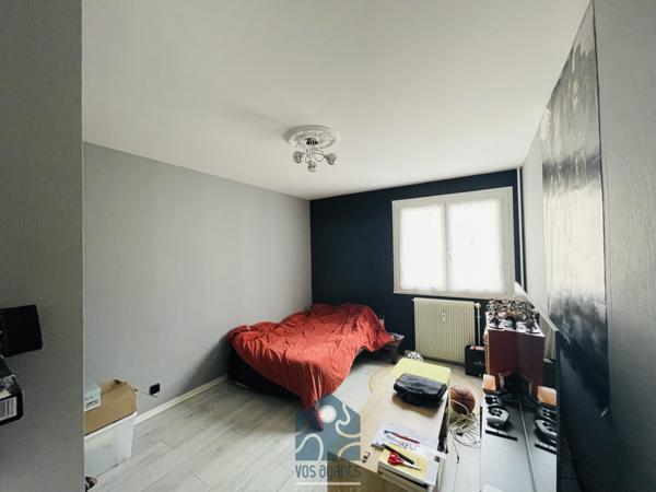 Appartement 4 pièces avec cave et stationnement