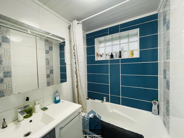 Appartement 4 pièces avec cave et stationnement