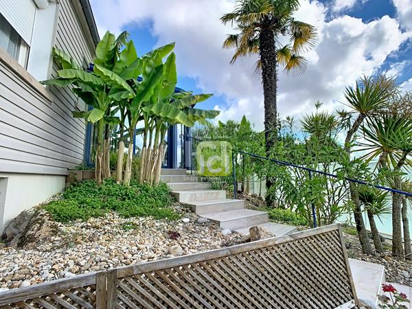 Maison familiale de 125 m² avec piscine chauffée et jardin exotique sans vis-à-vis