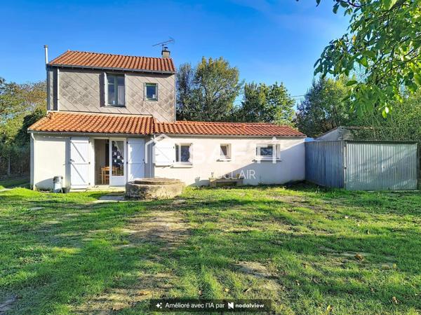 Maison de 93m² sur terrain de 1000m², 4 garages.