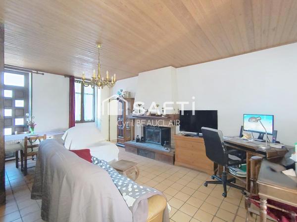 Maison de 93m² sur terrain de 1000m², 4 garages.