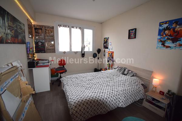 Appartement 2 chambres avec balcon, cave et stationnement privatif