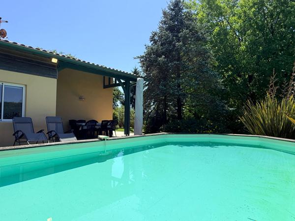 Maison familiale 5 chambres avec piscine sur terrain arboré