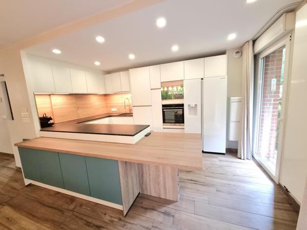 APPARTEMENT DE STANDING AVEC TERRASSE DONNANT SUR LE JARDIN