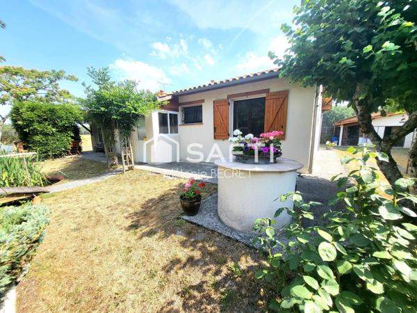 Maison de plain-pied au calme avec grand jardin et beau potentiel