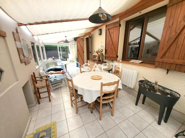 Maison de plain-pied au calme avec grand jardin et beau potentiel