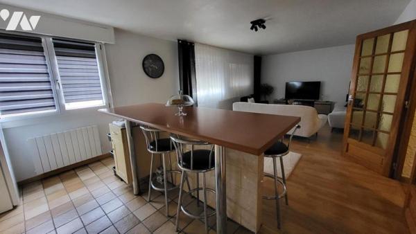 MANDEURE, En copropriété, un appartement loué  de type deux pièces avec cave et garage