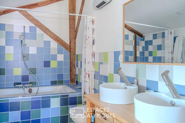 Ancien atelier réhabilité en maison de ville avec patio