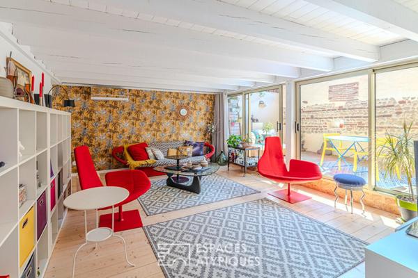 Ancien atelier réhabilité en maison de ville avec patio