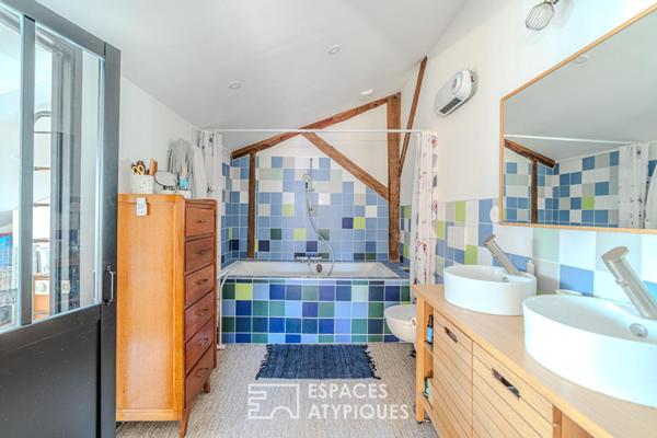 Ancien atelier réhabilité en maison de ville avec patio