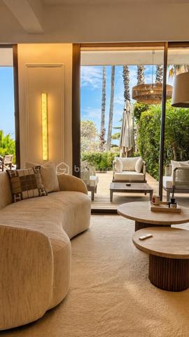 APPARTEMENT 3 PIECES - 72 M² - TERRASSE 49M² - VUE MER - GARAGE - PISCINE - TENNIS - 5 MIN CANNES
(English version Below)
Laurent Morin, spécialiste des propriétés avec vue mer, vous propose ce superbe appartement entièrement rénové par un architecte, situé au sein d’une résidence recherchée à Vallauris – Golfe-Juan.
D’une superficie de 72 m², l’appartement vendu meublé bénéficie d’une rénovation particulièrement soignée, réalisée avec des matériaux de grande qualité et une attention portée à chaque détail. Il se compose comme suit:
- Un hall d'entrée
- Un vaste séjour de 37m² avec cuisine qui ouvre sur la terrasse vue mer
- 2 chambres (12.6 et 9.3m²)
- Une salle de douche
- Un WC indépendant
- Une grande terrasse d'environ 50m² avec vue mer et Cap d'Antibes
- Un Garage de 21.5m² avec espace cave 

La résidence propose un cadre de vie privilégié avec un jardin parfaitement entretenu, une piscine et un terrain de tennis
Idéalement situé, l’appartement se trouve à seulement 5 minutes du centre de Cannes et de Golfe Juan tout en bénéficiant d’un environnement résidentiel et sécurisé.

Informations complémentaires
* Vendu meublé
* Charges de copropriété : 5200€ / an (433€ /mois)
* Taxe foncière : non connue à ce jour
* DPE : en cours

Contactez-moi 24h/24 et 7j/7 pour obtenir davantage d’informations ou organiser une visite privée.
--------------------------------------------
 3-BEDROOM APARTMENT – 72 SQM – 49 SQM TERRACE – SEA VIEW – GARAGE – SWIMMING POOL – TENNIS COURT – 5 MIN FROM CANNES
Laurent Morin, a specialist in sea-view properties, presents this elegant apartment, completely renovated by an architect, located in a sought-after residence in Vallauris.
Offering  72 sqm of living space, the apartment fully furnished has undergone a particularly high-quality renovation, using premium materials and with meticulous attention to detail.
It comprises:
* An entrance hall
* A spacious living room with an open-plan kitchen, opening onto the sea-view terrace
* 2 bedrooms
* A shower room
* A separate WC
* A large terrace of approximately 49 sqm, offering stunning views of the sea and Cap d’Antibes
* A garage with additional cellar/storage space

The residence offers a privileged lifestyle, featuring beautifully maintained landscaped gardens, a swimming pool and a tennis court.

Ideally located, the apartment is just 5 minutes from the centre of Cannes and Golfe-Juan, while enjoying a peaceful, secure and highly desirable residential setting.
 Additional Information :
* Fully furnished
*Co-ownership charges: 5200€ / year
*Property tax: Not yet known
*Energy Performance Certificate (DPE): In progress

Please contact me 24/7 for further information or to arrange a private viewing.