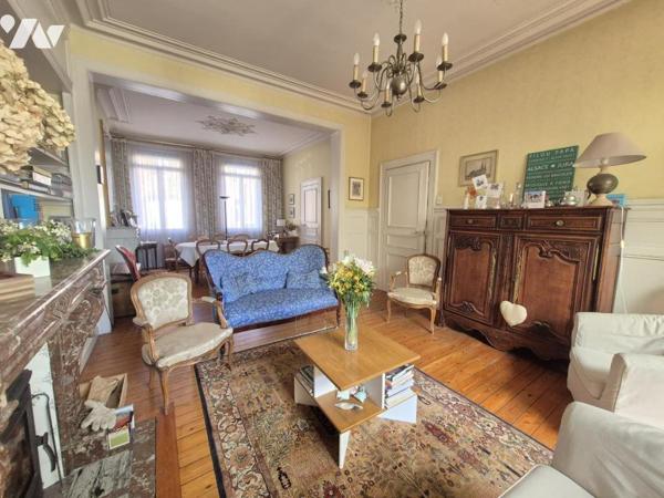 Maison bourgeoise avec jardin et grand garage – un bien rare en centre-ville