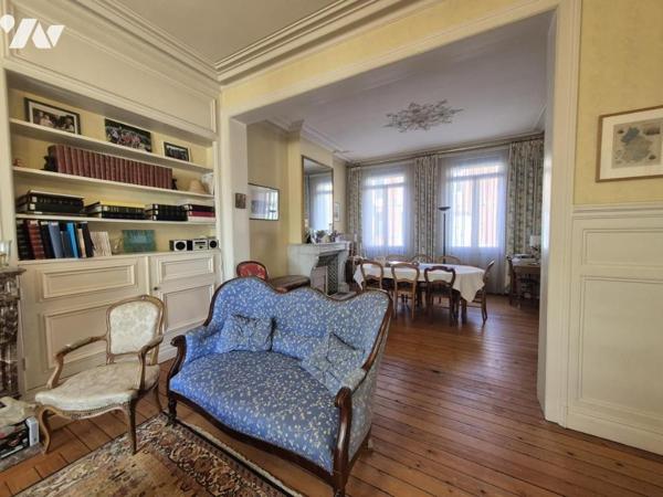 Maison bourgeoise avec jardin et grand garage – un bien rare en centre-ville