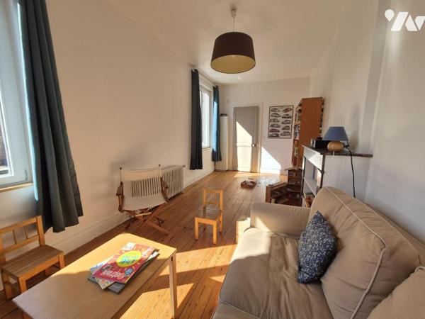 Maison bourgeoise avec jardin et grand garage – un bien rare en centre-ville