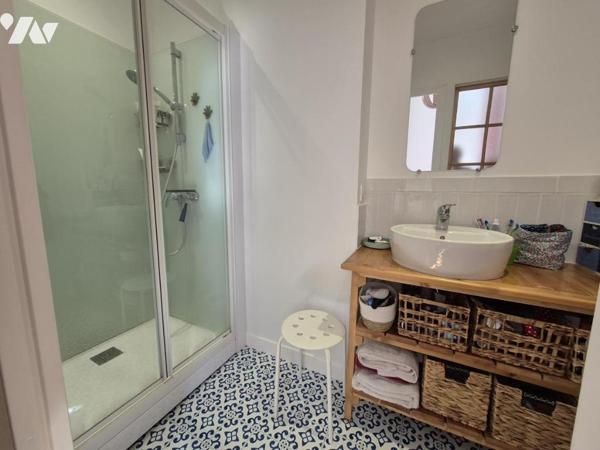 Maison bourgeoise avec jardin et grand garage – un bien rare en centre-ville