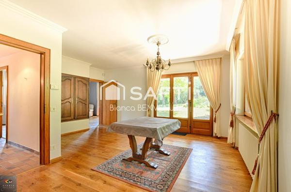 Appartement Entrée Privative - Rez-de-chaussée avec terrasse, terrain, garage 2vl, caves, place parking privative