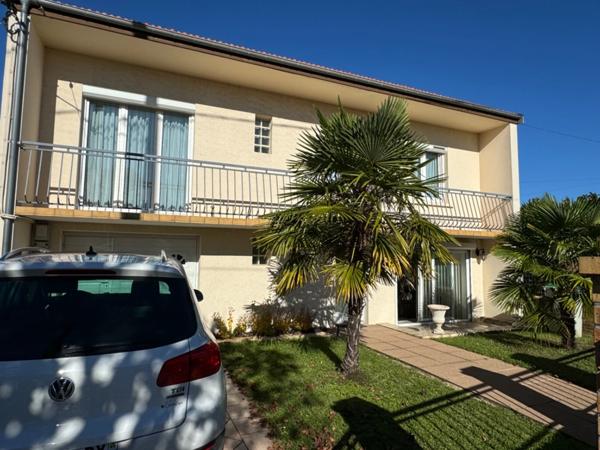 MAISON INDIVIDUELLE 3-4 CHAMBRES AVEC GARGE ET JARDIN