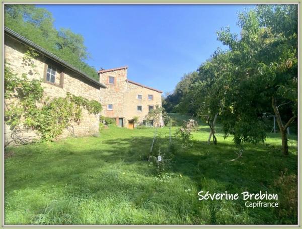 🏡 Maison en pierre de 166 m² avec ancien moulin et terrain de 1,8 hectare à Saint-Rémy-sur-Durolle