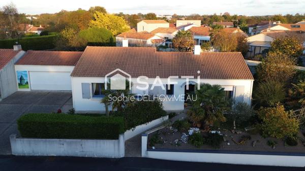 Maison plain pied 3 chambres, garage et jardin clos